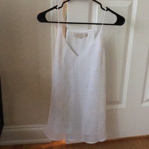Beautiful white and gold LOFT tank